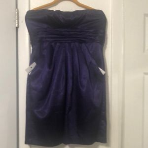 Purple strapless dress with deep pockets